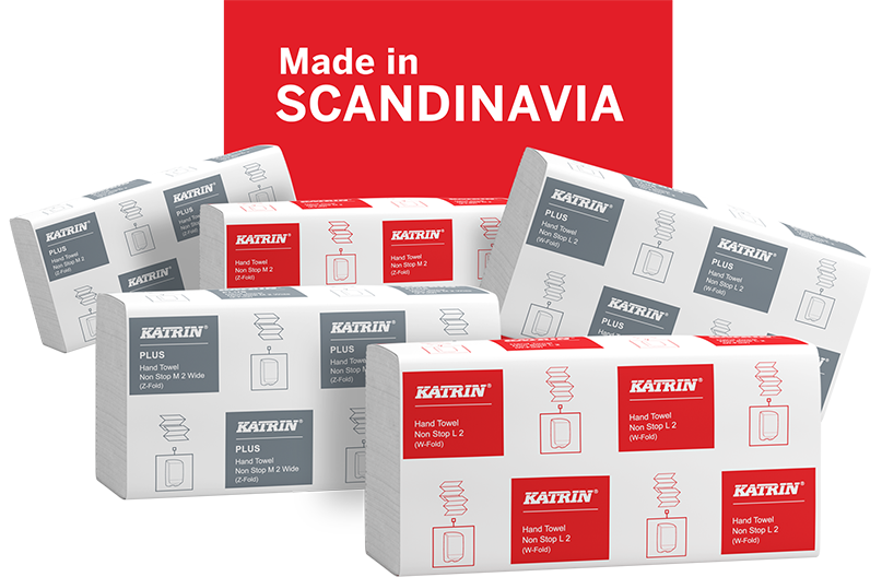 Fem pakker med Katrin papirhåndklær i grå og rød design foran et rødt felt med teksten "Made in SCANDINAVIA".
