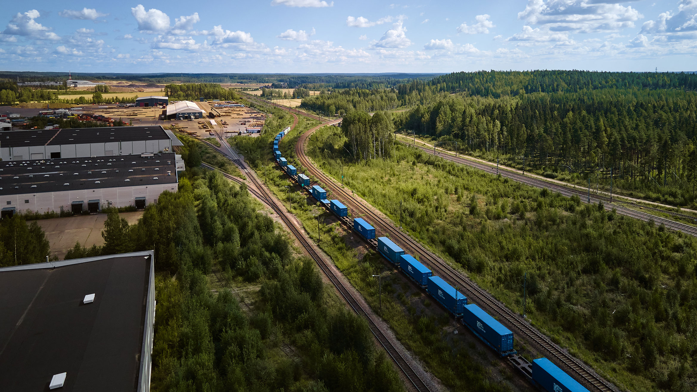 08-Blue-train-containers-on-rail.jpg