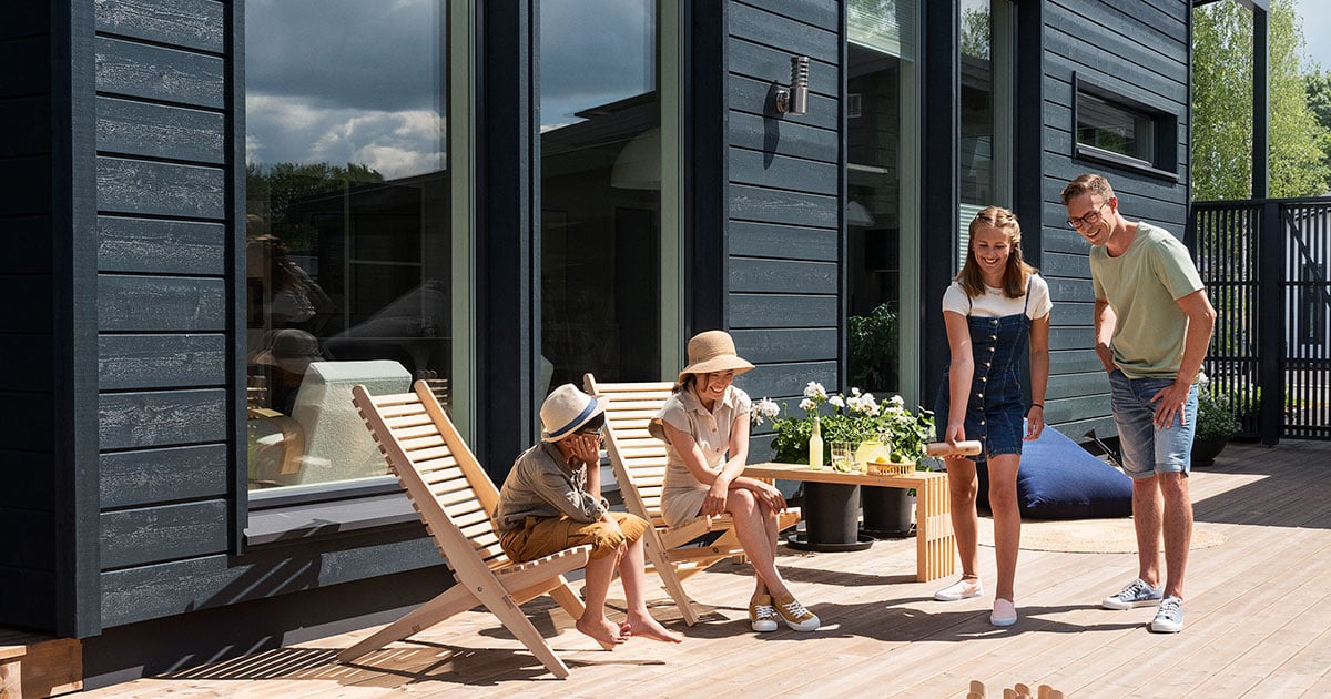 Family on a wood constructed porch 