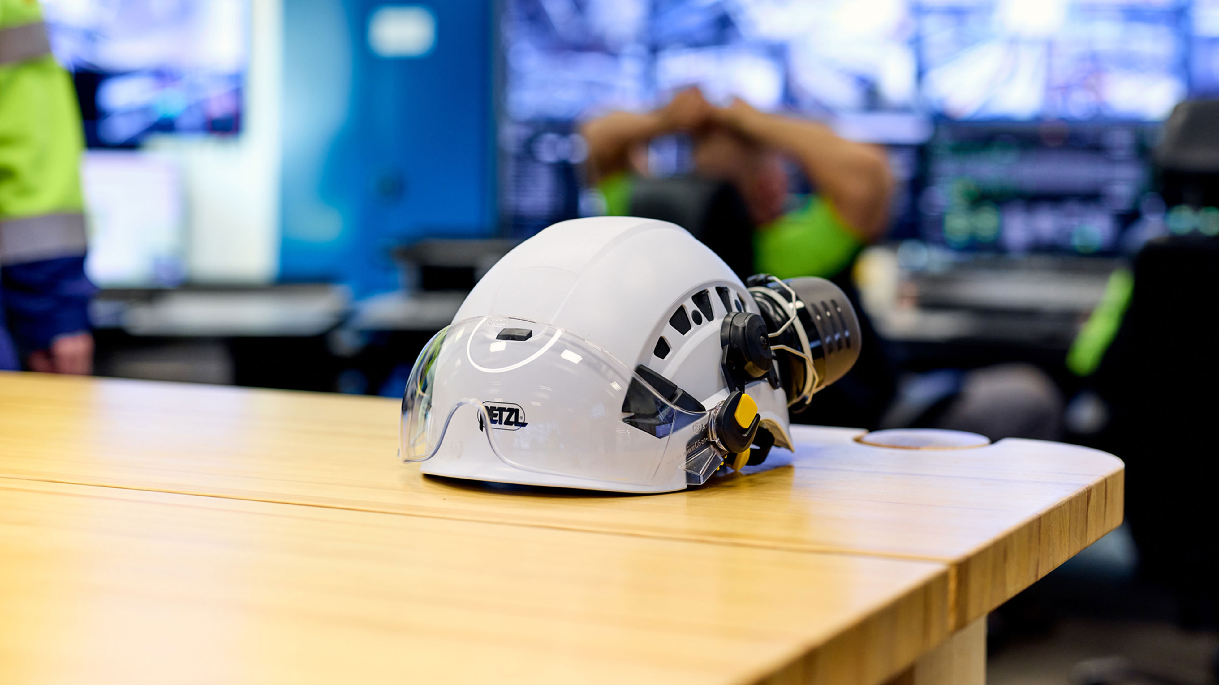 Safety helmet on a table in a control room