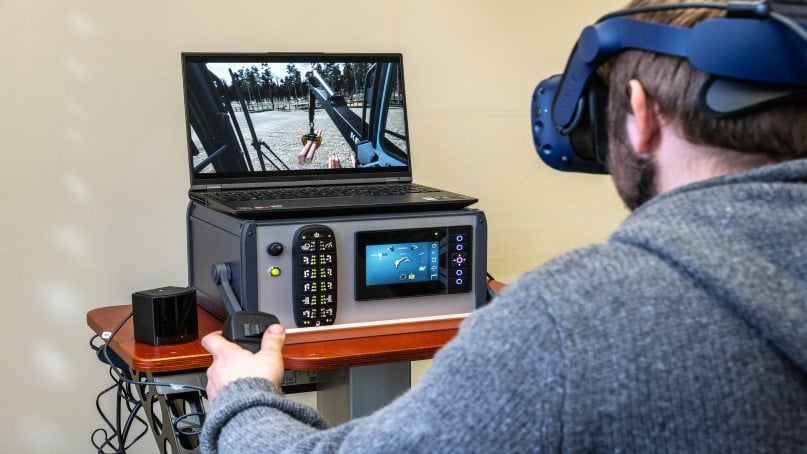 Team Juntunen employee is training with a simulator.