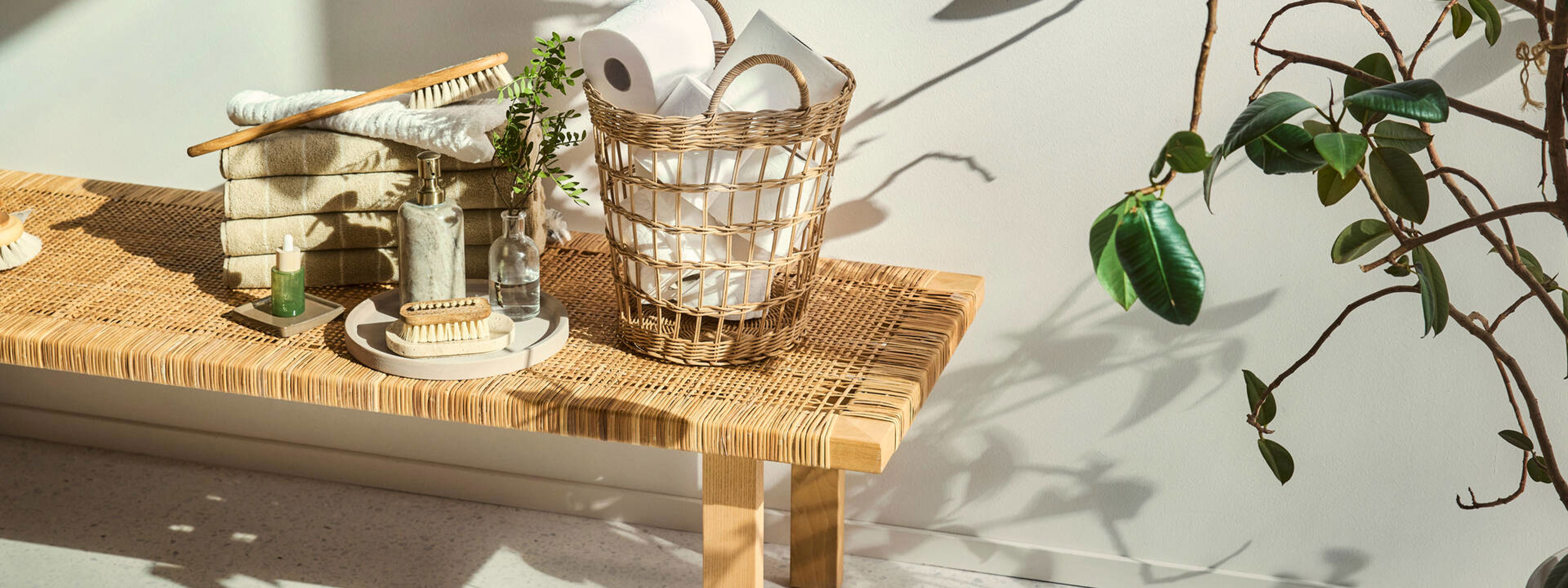 toilet paper rolls in a basket