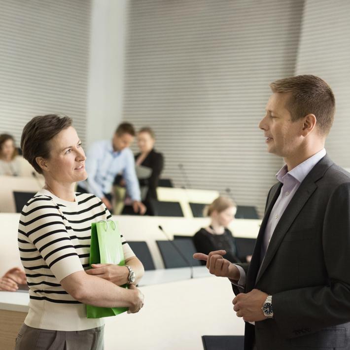 two office workers in a conference