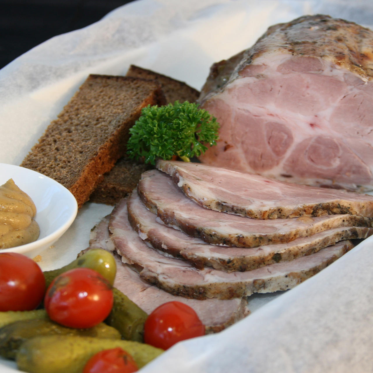 Cold baked pork in cooking paper