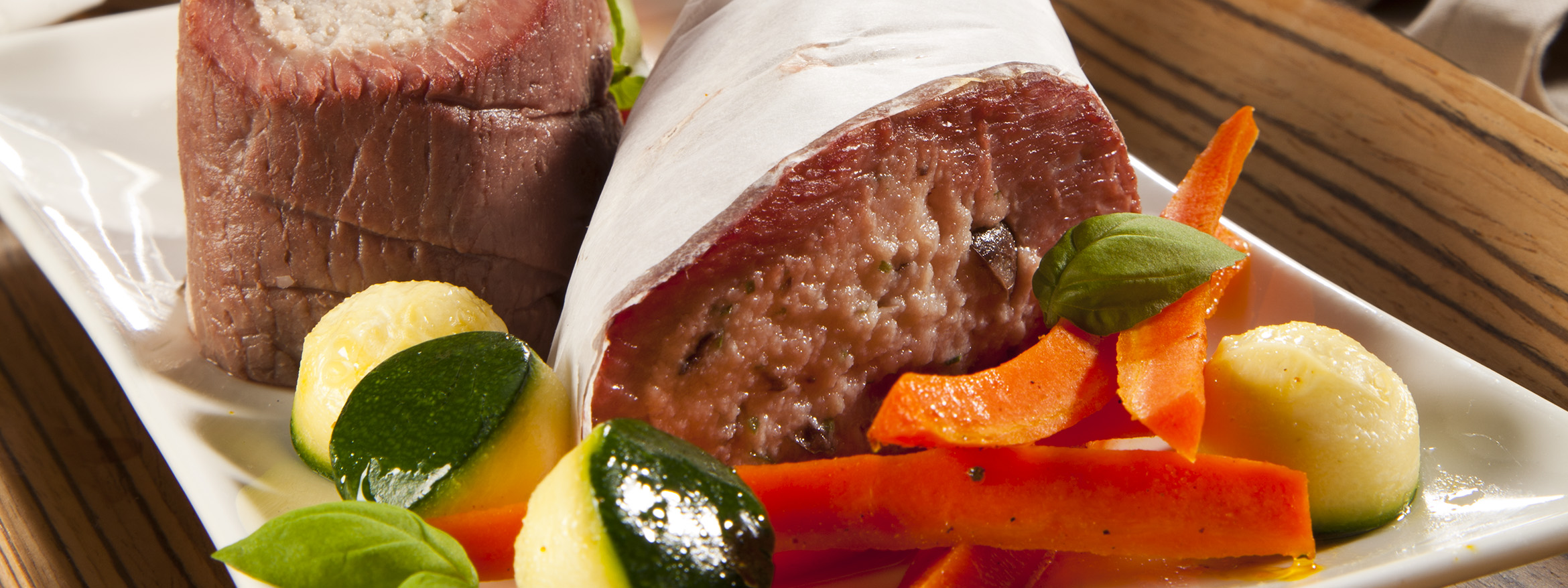 Lamb loin fillet rolls with truffle stuffing